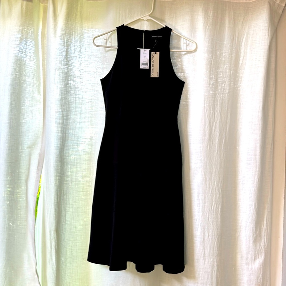 Brand New Banana Republic black dress with tags. Size 2 in Petites.